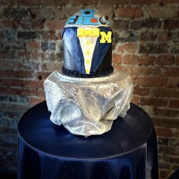 MeeChelly Cakes - R2D2 in a Michigan tuxedo groom's cake. - Custom Cakes Near Me MeeChelly Cakes - R2D2 in a Michigan tuxedo groom's cake. - Custom Cakes Near Me