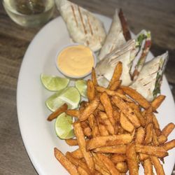 Black Horse Pub - Fish tacos (yes it looks like a burrito lol) with sweet potato fries & a glass of pinōt grigio.