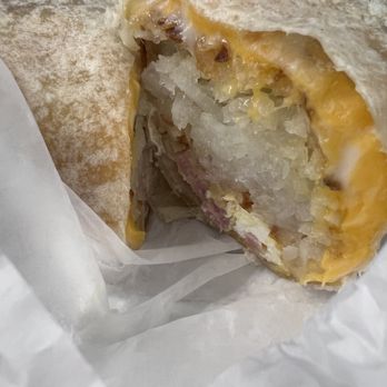 Peak Burger - All the hashbrown is clumped in the middle, sausage not visible until I took the first bite. (Pic 1 of 2) - Fast Food Near Me - La Mirada, California