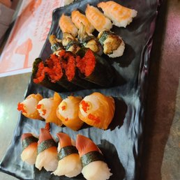 Surf Clam (Hokkigai), Salmon Rose, Tobiko (Flying Fish Roe), Unagi (Eel), and Ebi (Shrimp) Surf Clam (Hokkigai), Salmon Rose, Tobiko (Flying Fish Roe), Unagi (Eel), and Ebi (Shrimp)