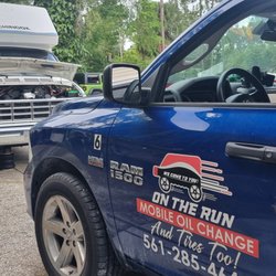 On the Run Mobile Oil Change and Tires Too - Stephen working on my brakes