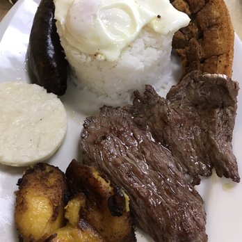 Mi Tierra Latina - Bandeja di Mi Tierra. Best chicharron accompanying - Colombian Near Me - Tampa, Florida Mi Tierra Latina - Bandeja di Mi Tierra. Best chicharron accompanying - Colombian Near Me - Tampa, Florida