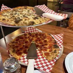 Mama Tina’s Pizza - Pepperoni pizza, and sausage and mushroom pizza.