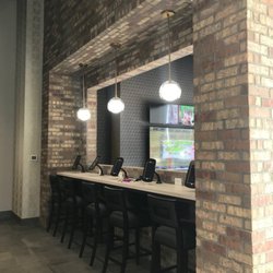 Caliber Auto Care - Stay Connected with Complimentary Lightning Fast Wi-Fi and iPad Station