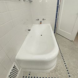 Tuff Tub Refinishing - After photo - Tuff Tub and Alran's crew save the day. 100 year old tub looks brand new.