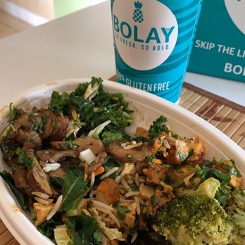 Bolay - Half Basmati Rice and half kale salad, mushroom, broccoli, lemon chicken, cilantro sprinkled on top, and pesto salsa on the side - New American Near Me - Miami Lakes, Florida Bolay - Half Basmati Rice and half kale salad, mushroom, broccoli, lemon chicken, cilantro sprinkled on top, and pesto salsa on the side - New American Near Me - Miami Lakes, Florida