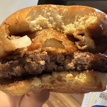 Cheers Sports Eatery - Holland, OH - Blue Devil BBQ Burger - one bite removed - Sports Bars Near Me - Holland, Ohio Cheers Sports Eatery - Holland, OH - Blue Devil BBQ Burger - one bite removed - Sports Bars Near Me - Holland, Ohio