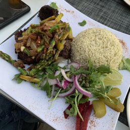 Photo of Serra's Dine & Dance - Studio City, CA, United States. Steak with rice, asparagus, and side salad. So delicious and filling.