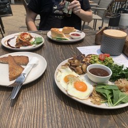 Freestate Cafe - Clockwise: vegetarian nut meat pie, Vegetarian keto breakfast, keto bread, vegan keto lasagne.