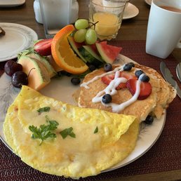 Mediterranean omelet and pancakes with local maple syrup.