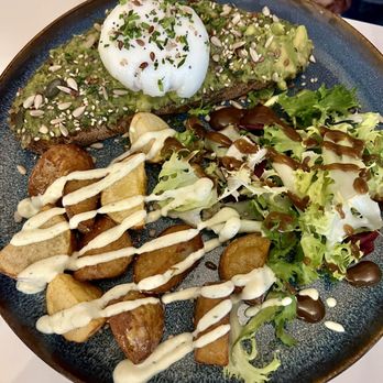 MIAM - Avocado toast with poached egg, potatoes, and salad - Coffee & Tea Near Me - Barcelona, B