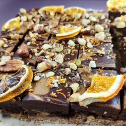 Chocolate and caramel marbled cake with caramelized nuts.