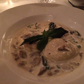 Pappardella - Cheese ravioli appetizer in truffled mushroom cream sauce with basil - Italian Near Me - New York, New York Pappardella - Cheese ravioli appetizer in truffled mushroom cream sauce with basil - Italian Near Me - New York, New York