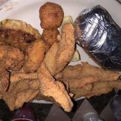 Murphy's Steakhouse - Ordered the sea food platter came with crab cake beans salad and baked potato as a side