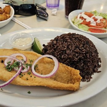 Polo Norte - Coral Way - Breaded fried fish with morro rice & salad - Cuban Near Me - Miami, Florida Polo Norte - Coral Way - Breaded fried fish with morro rice & salad - Cuban Near Me - Miami, Florida