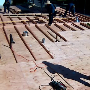 Royal Roofing - The Royal Roofing crew adding ribbing to add a slope to my flat roof.  Works perfectly. - Roofing Near Me - Bell Gardens, California