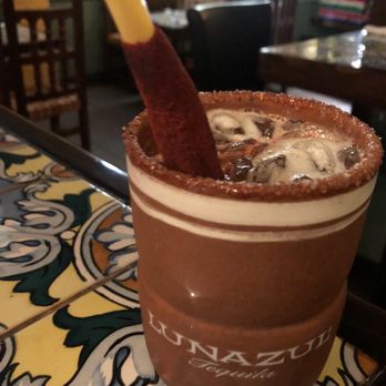 Sol Azteca - Drink with tamarind garnish - Mexican Near Me - Boston, Massachusetts