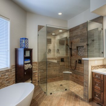 Reve Design & Custom Construction - Bathroom Remodel. Frameless glass walk in shower. Wood plank tile. - General Contractors Near Me Reve Design & Custom Construction - Bathroom Remodel. Frameless glass walk in shower. Wood plank tile. - General Contractors Near Me