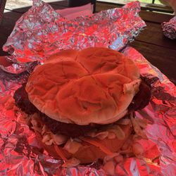 Back Yard Burgers - Not a great photo with the reflection of the umbrella. But look at the bun ratio to the chicken! Nashville Hot