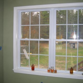 AGC Construction - a view of a backyard through a window - General Contractors Near Me - Lisbon, Maine AGC Construction - a view of a backyard through a window - General Contractors Near Me - Lisbon, Maine