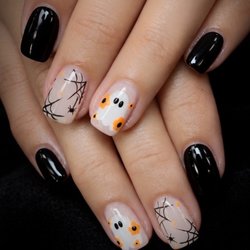 Pure Nails Spa - Cute, spooky, and perfectly polished. A playful Halloween moment at Pure Nails Spa.