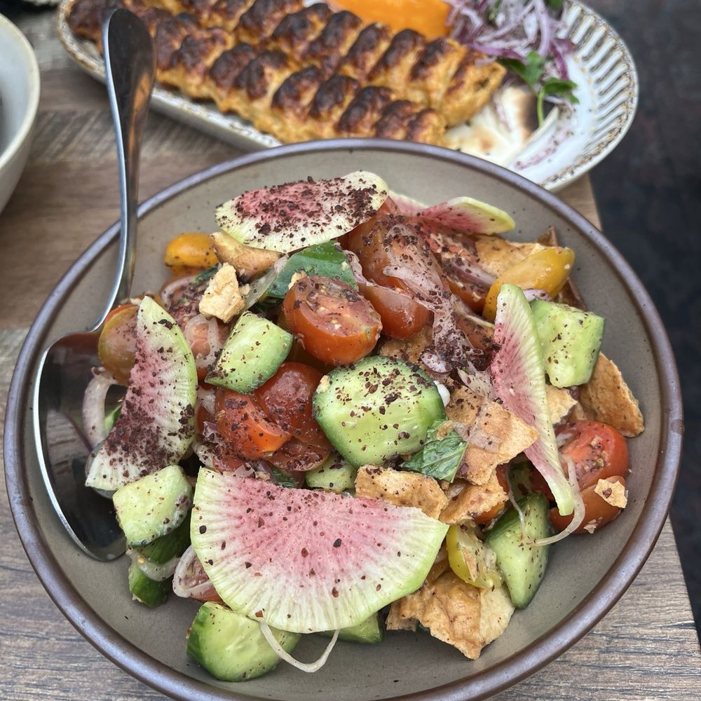 Delbar Middle Eastern - Heirloom Tomato Salad - Persian/Iranian Near Me - Atlanta, Georgia Delbar Middle Eastern - Heirloom Tomato Salad - Persian/Iranian Near Me - Atlanta, Georgia
