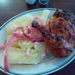 Chicken quarter and cooked cassava and onions