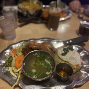 The Boat - My chicken served with flavorful rice and a fried egg on top. - Vietnamese Near Me - Seattle, Washington The Boat - My chicken served with flavorful rice and a fried egg on top. - Vietnamese Near Me - Seattle, Washington
