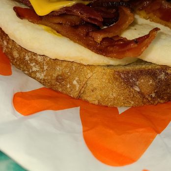 Dunkin' - Sourdough bacon egg & cheese breakfast sandwich - Coffee & Tea Near Me - Gaithersburg, Maryland