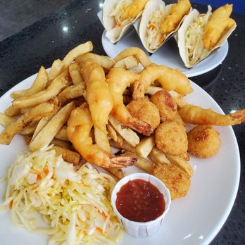 Halibut House Fish and Chips - Shrimp & Scallop Combo: 5 pcs battered tiger shrimp, 5 breaded bay scallops, served with chips ($18.95); Fish tacos ($9.95) - Fish & Chips Near Me - Scarborough, Ontario Halibut House Fish and Chips - Shrimp & Scallop Combo: 5 pcs battered tiger shrimp, 5 breaded bay scallops, served with chips ($18.95); Fish tacos ($9.95) - Fish & Chips Near Me - Scarborough, Ontario