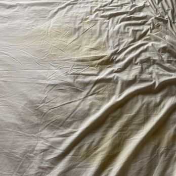 Hyatt Place Santa Barbara - Dirty bedsheet with massive yellow stain which was hard to see from the night we checked in... and we found in the next morning - Hotels Near Me - Santa Barbara, California