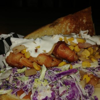 Mudbug Mobile Madness - Bacon wrapped jumbo shrimp, lemon pepper slaw and topped with a smoked corn and andouille relish. Finished with a creamy horse radish. - Food Trucks Near Me Mudbug Mobile Madness - Bacon wrapped jumbo shrimp, lemon pepper slaw and topped with a smoked corn and andouille relish. Finished with a creamy horse radish. - Food Trucks Near Me