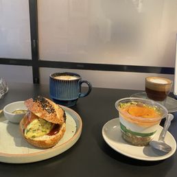 breakfast sandwich, skyr with muesli and drinks breakfast sandwich, skyr with muesli and drinks