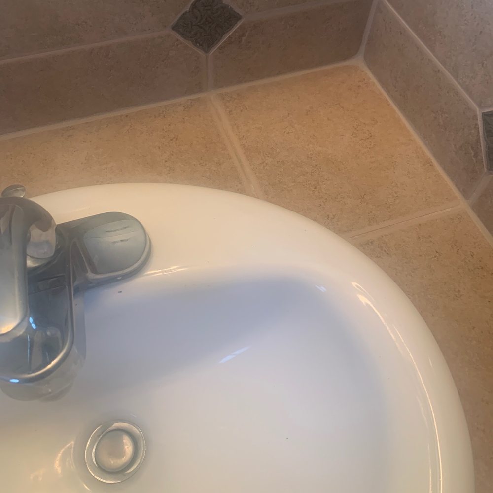 a bathroom sink with a faucet