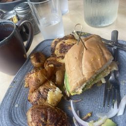 My sandwich and potatoes -about 1/2 way eaten. I couldn't wait! My sandwich and potatoes -about 1/2 way eaten. I couldn't wait!
