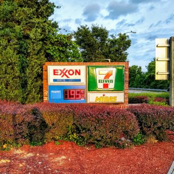 7-Eleven - a gas station sign in the foreground - Convenience Stores Near Me - Arlington, Virginia 7-Eleven - a gas station sign in the foreground - Convenience Stores Near Me - Arlington, Virginia
