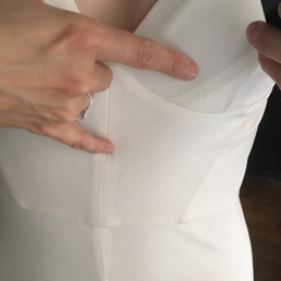 Spots on the bust and bodice of my wedding dress that were not there before I took them to Fame.