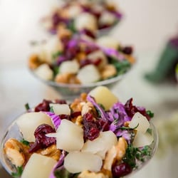 Jules Gourmet Catering - Fresh Kale Salad -Poached Pear, Dried Cranberries, Toasted Walnuts & apple Vinaigrette
