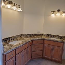 Tribeca Marble & Granite - Vanity top replacement, sink and faucet installation.