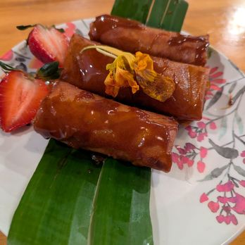 Kamayan Atl - Turon. 3 pieces for $7. Like a dessert lumpia. Kamayan ATL's version is filled with plantains and jackfruit, deep fried, caramelized sugar. - Filipino Near Me - Doraville, Georgia Kamayan Atl - Turon. 3 pieces for $7. Like a dessert lumpia. Kamayan ATL's version is filled with plantains and jackfruit, deep fried, caramelized sugar. - Filipino Near Me - Doraville, Georgia