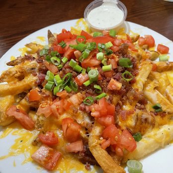 Smokey Bones Melbourne - Loaded Cheese Fries - Barbeque Near Me - Melbourne, Florida Smokey Bones Melbourne - Loaded Cheese Fries - Barbeque Near Me - Melbourne, Florida