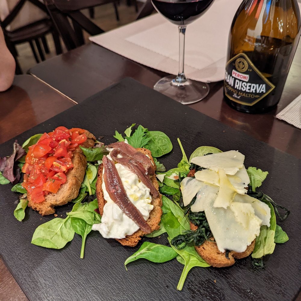 Enosteria Capolecase - Bruschetta, rating from best to last: far left, middle, far right - Mediterranean Near Me - Rome, RM Enosteria Capolecase - Bruschetta, rating from best to last: far left, middle, far right - Mediterranean Near Me - Rome, RM