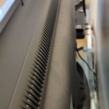Jaycee Cleaning - Dust along the back of a tv - Home Cleaning Near Me