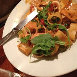 Fresh pasta w calamari, cherry tomatoes, olives, arugula, deliciousness.