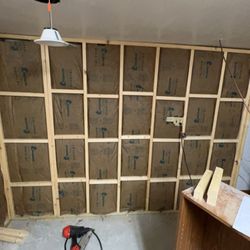 Hannacks Home Services - Insulating and prepping for wallboard.