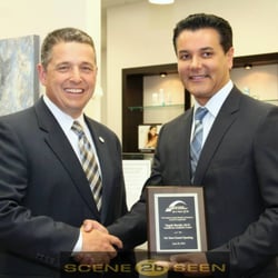 Lansdowne Aesthetic Center - Tony Howard presenting Yaqub Baraki M.D. our Loudoun Chamber of Commerce plaque.