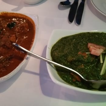Karavalli - Chicken tikka saag on the right. - Indian Near Me - Latham, New York Karavalli - Chicken tikka saag on the right. - Indian Near Me - Latham, New York