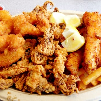 Fishermen's Catch - Captain's Combo - shrimp, fish, calamari, and fries. This foot-long plate served me for lunch and dinner :) happy tummy. - Seafood Markets Near Me - Oxnard, California Fishermen's Catch - Captain's Combo - shrimp, fish, calamari, and fries. This foot-long plate served me for lunch and dinner :) happy tummy. - Seafood Markets Near Me - Oxnard, California