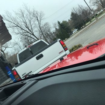 Dunkin' -  a white truck parked in a parking lot - Donuts Near Me - Waukesha, Wisconsin