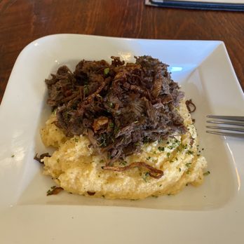 Potomac Point Winery - This was something with cheese grits, poached egg, and some shredded beef and shallots? Extremely bland - 3/10 stars - Wineries Near Me - Stafford, Virginia